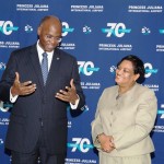 H.E. Gov. Eugene Holiday, stresses a point during a light moment with SXM managing director Regina LaBega. 